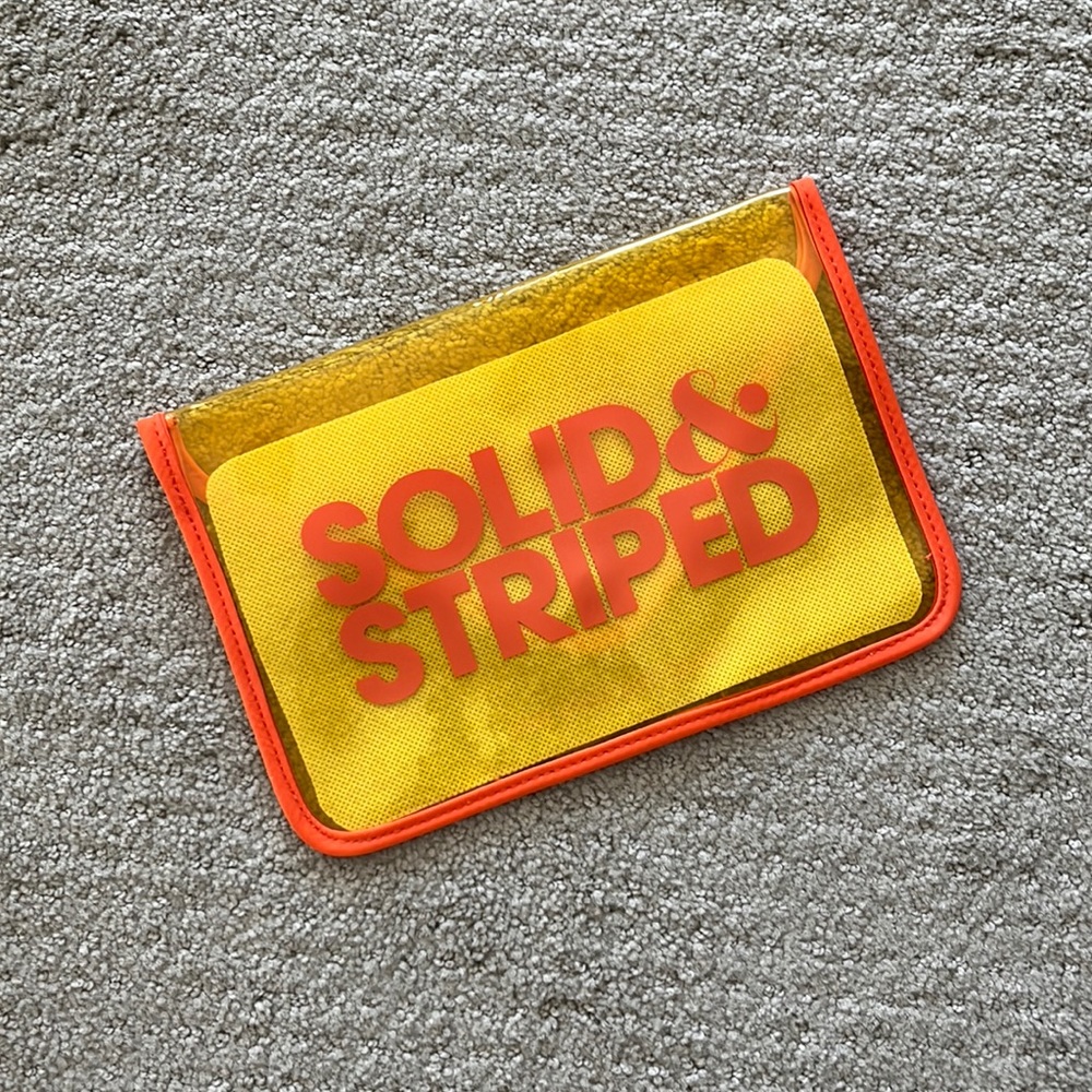 5/$25- Solid & striped wet/cosmetic bag
